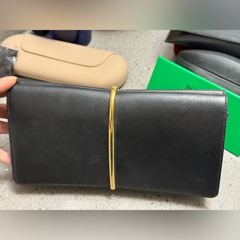 COPY - Nina Ricci black leather clutch   Gold hardware